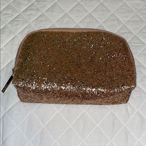 Small gold cosmetic bag